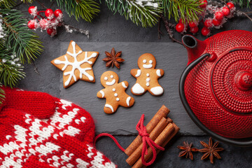 Christmas card with gingerbread cookies and tea