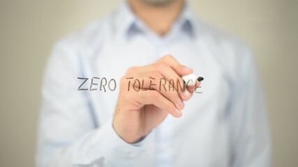 Zero Tolerance , man writing on transparent screen