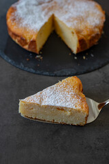 typical German Cheesecake on a plate on a table
