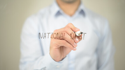National Debt , man writing on transparent screen