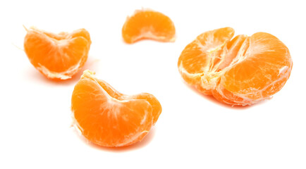 Slices of tangerine isolated on a white background.