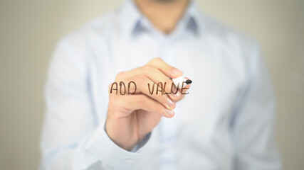 Add Value , man writing on transparent screen
