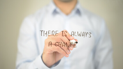 There is always a Chance, man writing on transparent screen