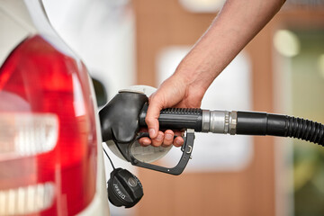 Close-up of a man pumping diesel in to the tank