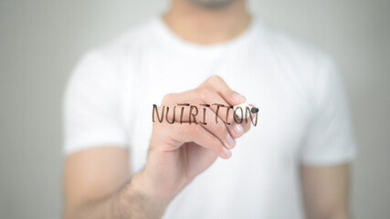 Nutrition, man writing on transparent screen