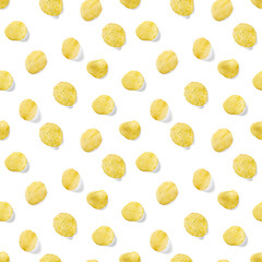 Seamless pattern made from Potato chips on white background flat lay. potato snack chips isolated Fast food banner.
