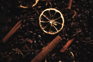 Coffe background with dried oranges and cinnamon © Exploder