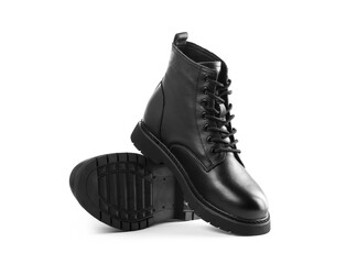 Black leather boots with laces. Close up. Isolated on a white background