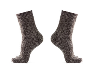 Wool socks on the foot. Close up. Isolated on a white background