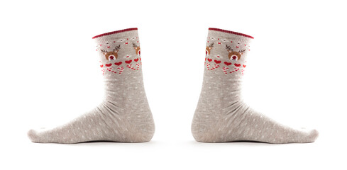Christmas socks on the foot. Close up. Isolated on a white background