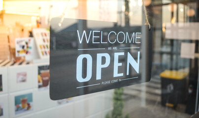 "Welcome we are open"
้hang tag at cafe or restaurant hang on entrance door.