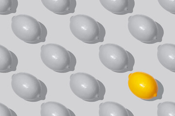 Seamless pattern Gray and yellow lemons in the color of the year 2021