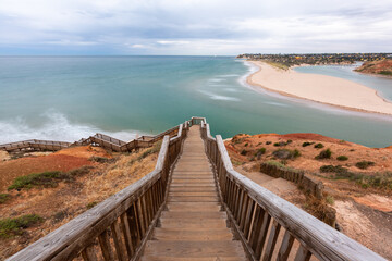 Fototapeta na wymiar The Southport stairs at sunrise located in Port Noarlunga South Australia on december 14th 2020