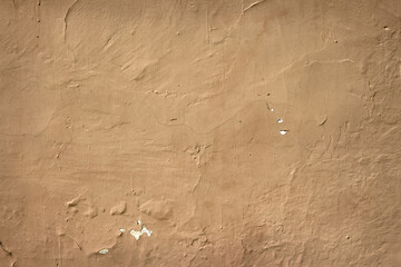 Old wall, old wall with peeling paint light brown background, blurry image