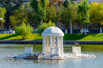Astrakhan, Russia. The ancient pond with the name Swan Lake in center of city