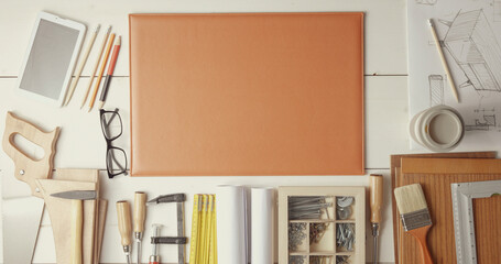 Creative designer desk with DIY tools