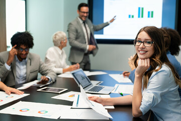 Creative business people working on business project in office