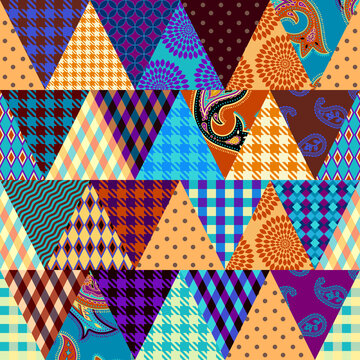 Seamless background pattern. Textile patchwork pattern of triangles. Vector image