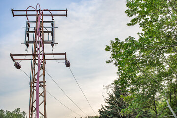 The rusty electric pole and sky in Turkey.