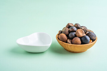A dish of dried camellia seeds