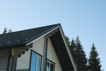 Beautiful white wooden house against clear blue sky