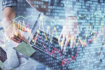 Double exposure of man and woman working together and forex graph hologram drawing. Financial analysis concept. Computer background. Top View.