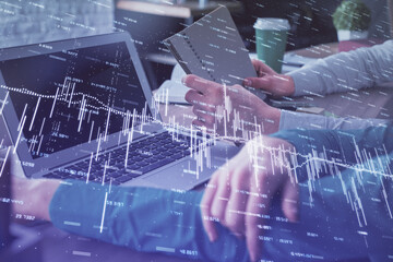 Double exposure of man and woman working together and forex chart hologram. Business concept. Computer background.