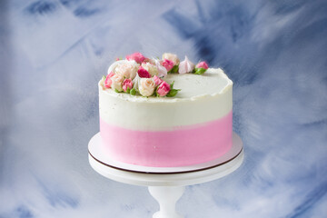 Modern pink cake on stand  with fresh roses . Concept for Wedding , St. Valentine's Day, Mother's Day, Birthday Cake.