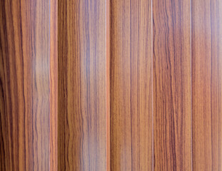 A vertical wood grain background with elegance used as a backdrop.