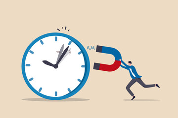 Time management, control business time or work deadline concept, smart businessman using magnet to stop clock hand metaphor of time manipulation.