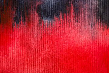 red and black watercolor background on textured paper