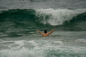 Early morning swimmers heading out at the famous Coogee Beach for an early morning swim