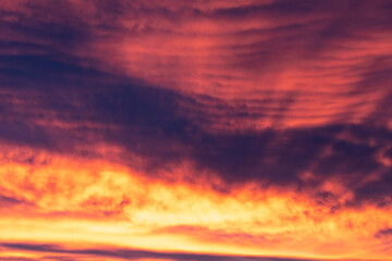 Backgrounds and textures. Beautiful and dramatic colorful sky with clouds at sunset. Sky texture. Abstract nature background.