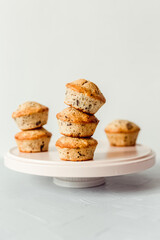 Chocolate banana muffins on a round pink dish