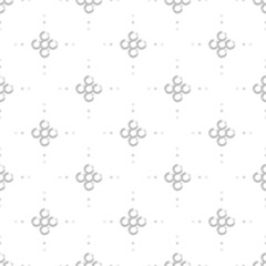 Seamless modern pattern with gray hand drawn circles, rhombs and dots isolated on white background. Abstract monochrome illustration. Diagonal composition. 