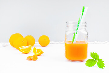 carrot and orange juice with yellow slices