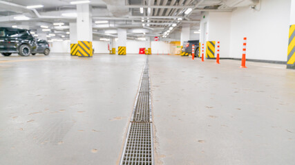 empty underground car park, focus on foreground blurred background
