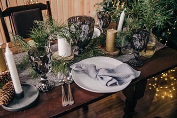 Christmas table with chairs in a room with festive decor