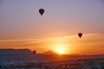 Fototapeta na wymiar Hot air balloons at sunrise in Cappadocia, Turkey