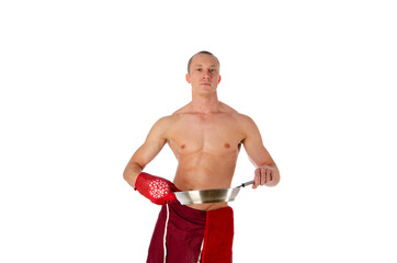 Fototapeta premium Sexy shirtless young chef or waiter posing, wearing black apron on naked body, isolated on white background. 