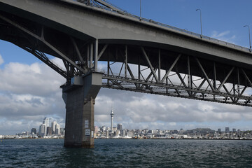 Fototapeta premium Auckland harbour bridge crossing, with Auckland city in the background.