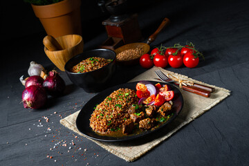 Buckwheat groats baked in the oven with beef goulash