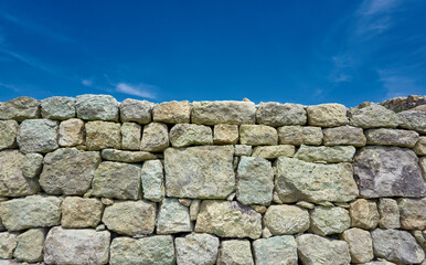 Ancient stone wall in near plan