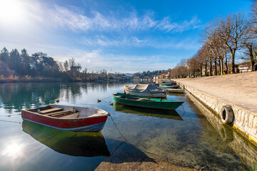 Fishing boats on Adda River in Brivio Town of Italy