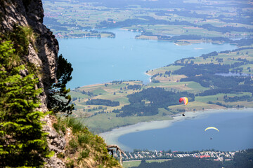  Paragliders flying over Bavarian lake Forggensee