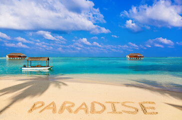 Word Paradise on beach