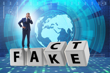 Face or fact concept with turning cubes