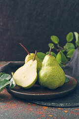 Plate with fresh ripe pears on table © Pixel-Shot