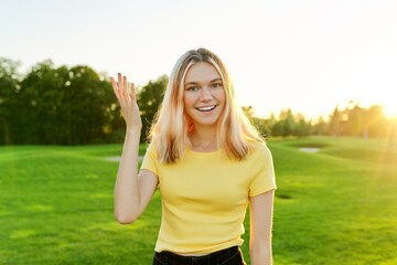 Gesturing teenager talking at camera, student 16, 17 years old giving interview