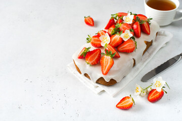 Summer cake with strawberry on white table background,